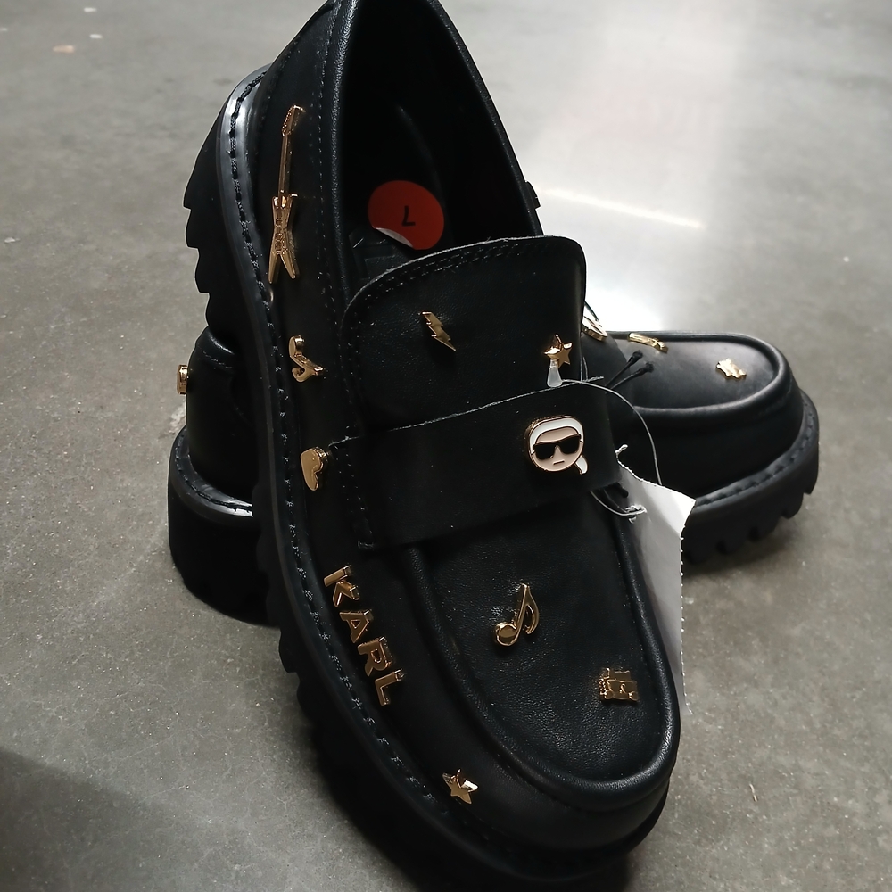 Stylish Black Loafers with Gold Accents